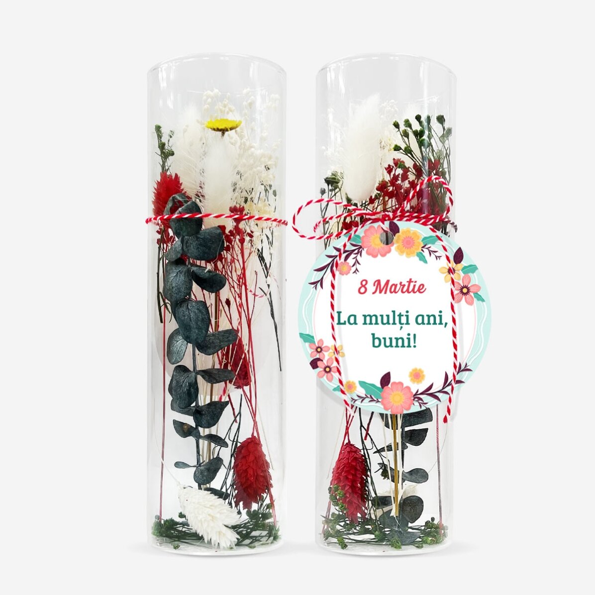 Skleněná ozdoba „martisor“ s konzervovanými květinami, s osobním vzkazem