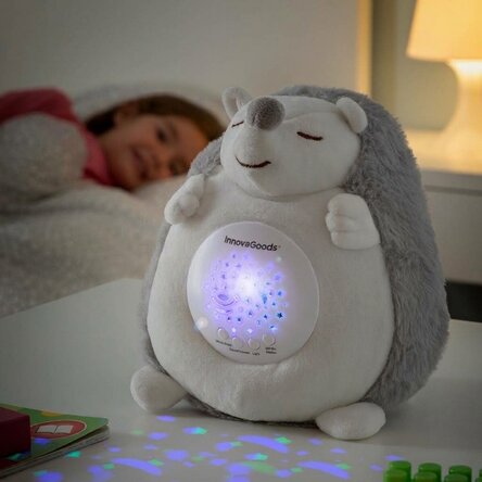 Plush hedgehog toy with light and sound projector